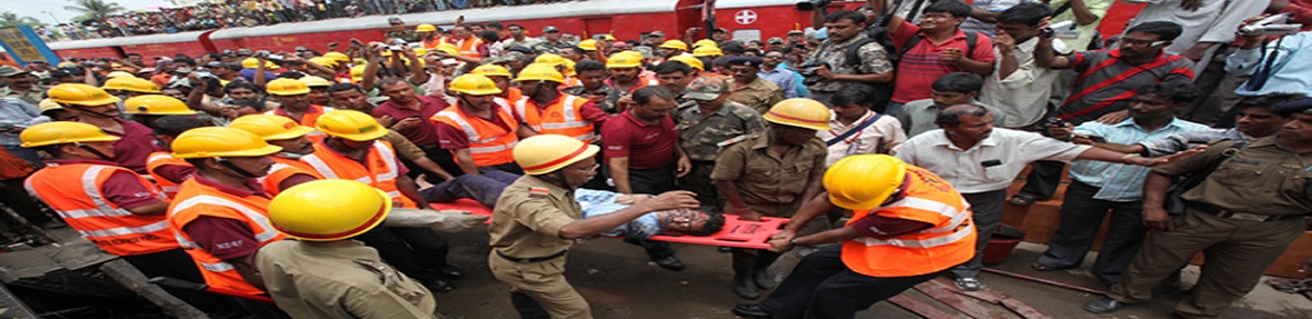 Rescue workers take out an injured man out of the Uttarbanga Express at the accident site at Sainthia station in West Bengal.